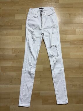 Fashion Nova White Distressed High-Rise Skinny Jeans